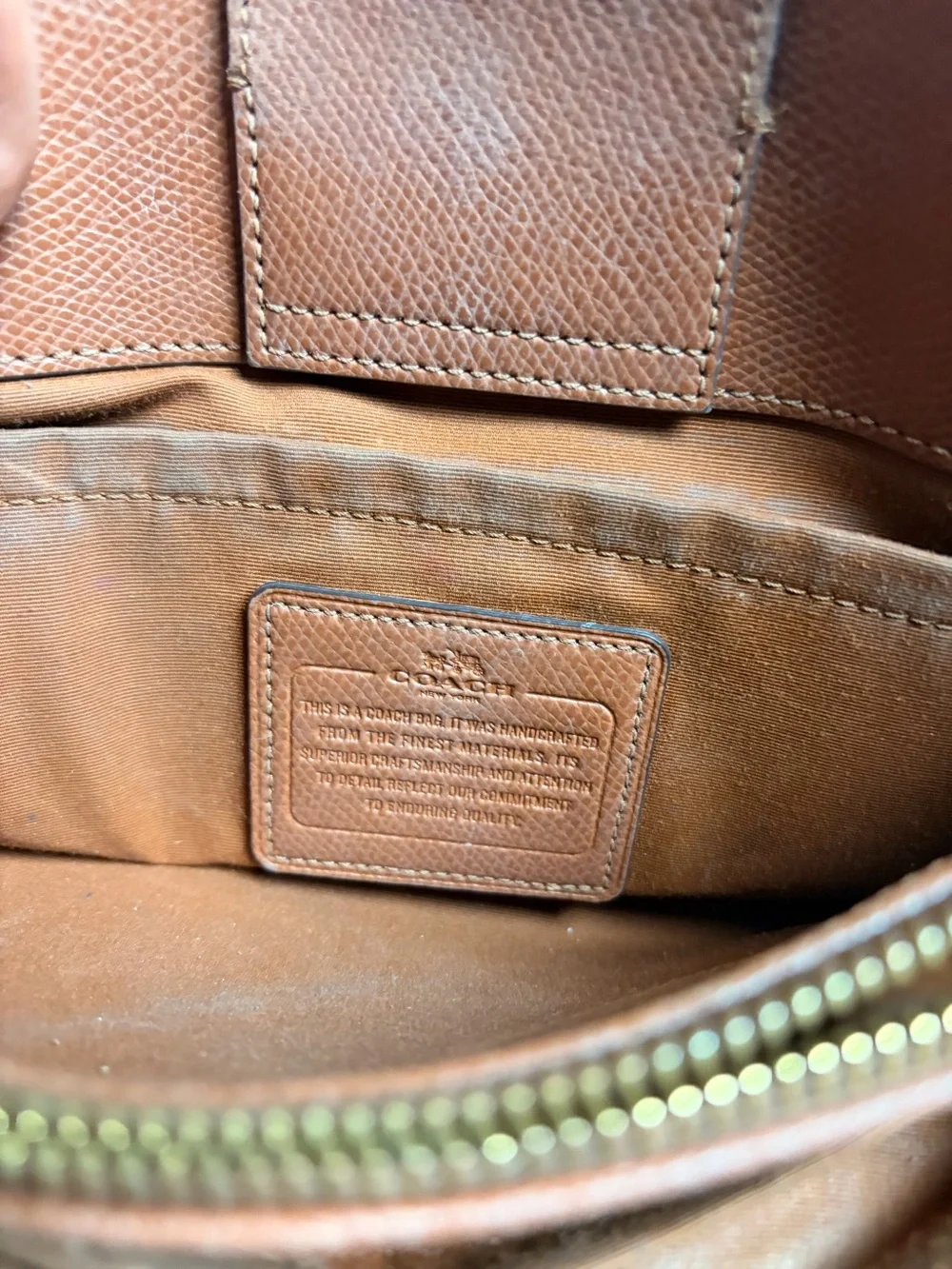 Brown Coach leather and gold-tone hardware RETAIL PRICE IS $395